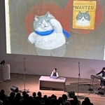 「かなしきデブ猫ちゃん」の新しい絵本出版を記念して開かれたイベント＝県立美術館ミュージアムホール