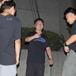 明石海峡大橋のたもとでラップの練習を重ねる少年たち＝垂水区内