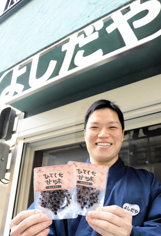 兵庫区に開いた製造拠点で、新商品を紹介する吉田一真さん＝神戸市兵庫区塚本通５