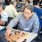 緊迫した戦いを繰り広げた出場者＝神戸新聞本社