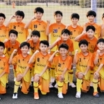 大会に向けて、気合を入れる選手ら＝三木市志染町三津田、三木総合防災公園