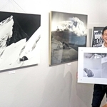 写真展を開く宇田川洋二さん＝ウッディタウン市民センター