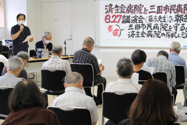 「統合ＮＯ！」と掲げて開かれた市民集会＝神戸市北区藤原台中町１