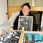 左手のリハビリを経て切り絵作品を自宅で作る本林俊昭さん＝上郡町船坂