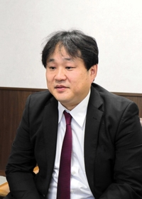 赤とんぼ広場跡地への移転を語る徳永憲威理事