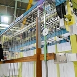 西村製作が開発した自動箸入れ機＝たつの市誉田町広山