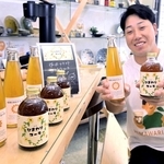 ヒマワリの種の搾りかすを使ったひまわりコーラを開発した重田直人さん＝佐用町佐用