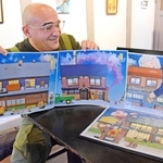 龍野城下の古民家をイラスト化したペルー・フレデリックさん。ペンネームの「ワカメタマゴ」は好きなそばのトッピングという＝たつの市龍野町富永