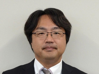 長尾明憲氏