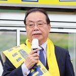 谷公一氏