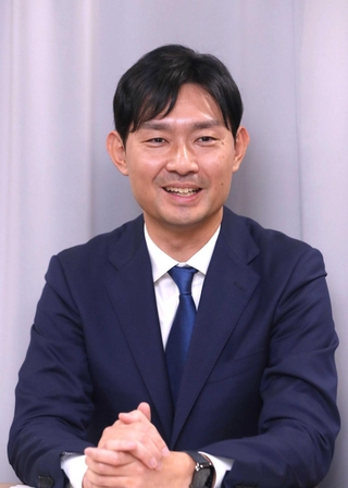 山田基靖氏