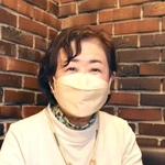 心身ともに苦しんだ痛みを振り返る吉浦仁美さん＝洲本市内