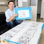 ４０年前に故森本雅樹さんらがアルタイルに発信したイラスト。「アルタイル星人から返信があるなら、同じように進化の過程を教えてくれるのでは」と話す鳴沢真也さん＝神戸市西区学園西町８、兵庫県立大