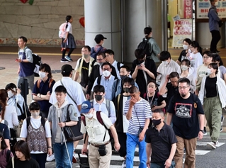 ３カ月後、マスクをしていない人はまだ半分以下＝６月１３日午後