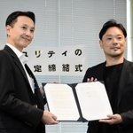 締結書を交わした村井紀之本部長（左）と青柳史郎社長＝神戸市中央区雲井通７、ミント神戸
