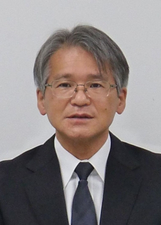 会見で今後の対応について語る木場健之理事長＝７日午前、宝塚市栄町１