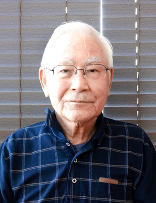 「大動脈弁狭窄症を患ったことで、健康の大切さを実感した」と話す新康彦さん＝西宮市内