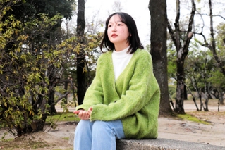 原発事故の後、宝塚市に避難した伊藤あかねさん。現在は大学生になった＝岡山市北区