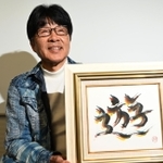 書への思いを語る原田伸郎さん＝１５日午後、神戸市中央区東川崎町１、ラジオ関西（撮影・斎藤雅志）