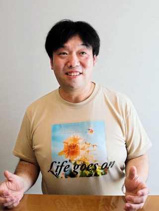 「『以前よりやせたね』と言われるとうれしくなる」と語る吉村伸行さん＝尼崎市