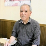 「日本兵に殺された祖父らの無念を伝えるのは、生き残った私の使命」と話す仲村元一さん＝西宮市池田町