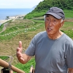 地震で妻と長男を亡くした出口彌祐さん＝８月、石川県輪島市白米町（撮影・長嶺麻子）