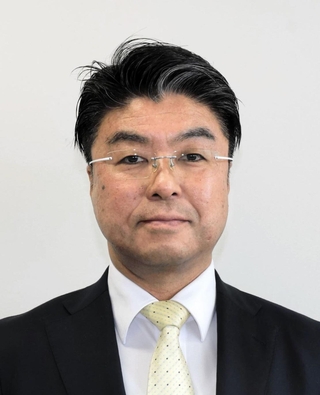 門間雄司氏