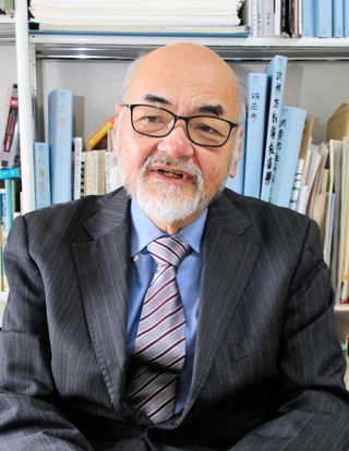 選挙制度の在り方について提言する新川達郎・同志社大名誉教授＝京都市右京区