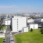 クボタ旧神崎工場の跡地に立つ同社阪神事務所。周囲には深刻な石綿被害が広がっている＝尼崎市浜