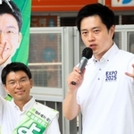 参院選兵庫選挙区に立候補した新人吉平敏孝氏（左）の応援演説をする日本維新の会の吉村洋文代表＝１６日、西宮市北口町