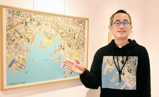 阪神・淡路大震災から３０年の節目となる２０２５年１月１７日の神戸の鳥瞰図を描いた青山大介さん＝神戸市中央区