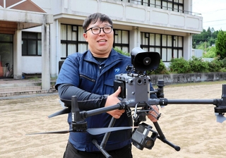 災害現場でドローンを迅速に活用できるため、指針などの策定を求めるＴ＆Ｔの中田耀介部長＝兵庫県佐用町豊福