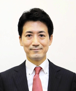 越田謙治郎氏