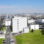 クボタ旧神崎工場の跡地に立つ同社阪神事務所。周囲には深刻な石綿被害が広がっている＝尼崎市浜