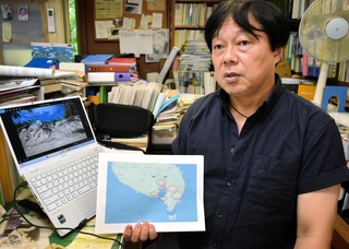 フィリピン・ミンダナオ島の地震被害を語る吉椿雅道さん＝神戸市兵庫区中道通２