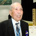 全国戦没者追悼式に参列した徳田保幸さん＝１５日午前、東京都千代田区、日本武道館