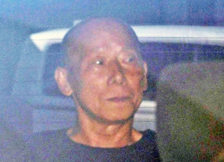 送検される亀谷直人容疑者＝２日午前９時２６分、神戸市中央区橘通１