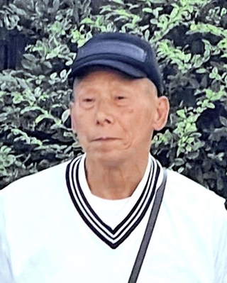 逮捕直前の亀谷直人容疑者＝９月３０日午後１時４４分、神戸市兵庫区荒田町（近隣住民提供）
