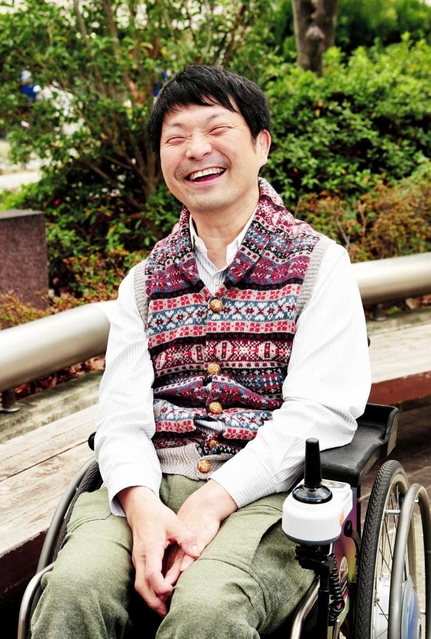 健常者と障害者が共に学び、育つ環境の必要性を訴える玉木幸則さん＝西宮市内