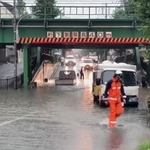 急激に降った雨により冠水したアンダーパス＝芦屋市内（読者提供）