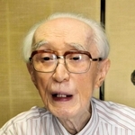 旧友と遊んだ日々を懐かしむ河野通一さん＝姫路市白浜町