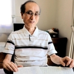 兄洋一さんから届く手紙に「気遣いとユーモアは変わってない」と話す白井勝彦さん＝神戸市垂水区