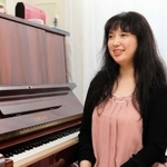 「見えるようになった時のため、子どもの写真や動画を撮影しておいてと夫にお願いしています」と話す前川裕美さん＝宝塚市内