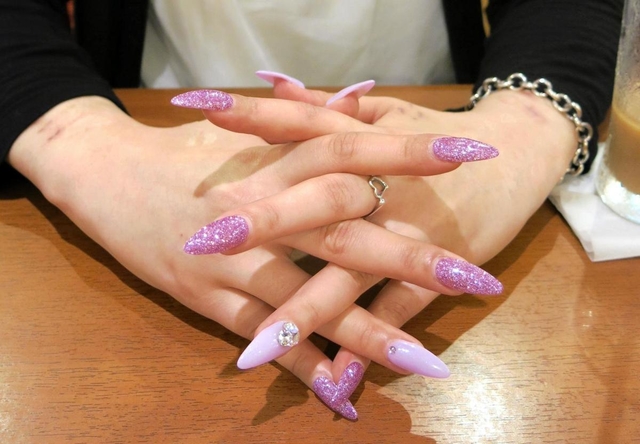 風俗店で働く女性＝神戸市中央区