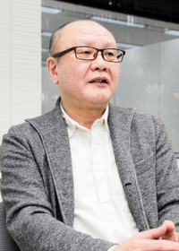 エイズパニックの教訓を訴える繁内幸治さん＝神戸市内