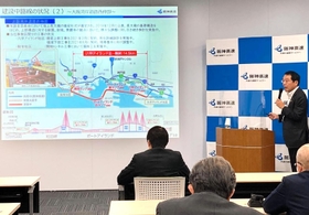 大阪湾岸道路（阪神高速湾岸線）西伸部の工事状況について報告する吉田光市社長＝大阪市北区