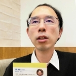 災害時に聴覚障害者が直面する悩みを伝える防災士の片岡幸壱さん＝神戸市東灘区