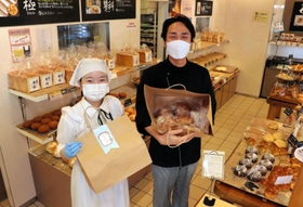 従来は廃棄していたパンを社会貢献に生かす、新しい販売システムを試行中のケルン＝神戸市東灘区御影中町１