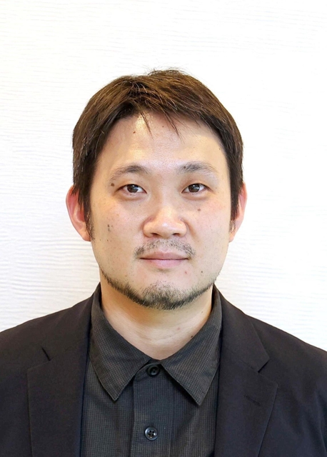 濱口竜介監督（２０２１年１２月、東京都内）