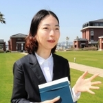 「防災を通じた人のつながりが面白い」と話す岸本くるみさん＝神戸市中央区、神戸学院大学